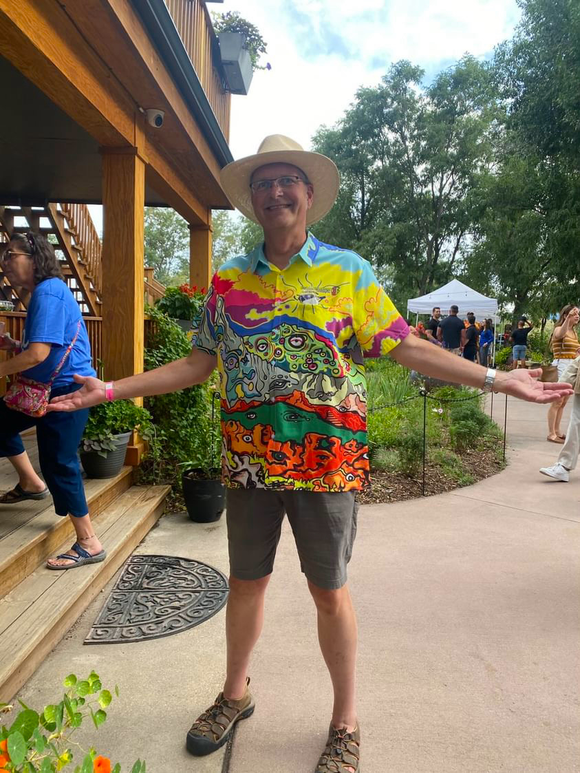 The 'Trippy Mountain' Friend-Making Shirt – See the Wild 🎨🐟👁️ Dive into a world of imagination with the Trippy Mountain Button-Up, featuring Zach Ray’s hand-drawn Front Range Mountains and Garden of the Gods with faces and characters embedding into the scene, this shirt captures the spirit of adventure—perfect for those who love to stand out and spark conversations. More than just a shirt, it’s a statement piece that invites curiosity, connection, and creativity. Whether you're by the water, in the mountains, or out in the wild, the Trippy Mountains is your bold companion for any adventure. ✨ Wear the unexpected. Make new friends. Unlock the Wild Within.