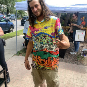 The 'Trippy Mountain' Friend-Making Shirt – See the Wild 🎨🐟👁️ Dive into a world of imagination with the Trippy Mountain Button-Up, featuring Zach Ray’s hand-drawn Front Range Mountains and Garden of the Gods with faces and characters embedding into the scene, this shirt captures the spirit of adventure—perfect for those who love to stand out and spark conversations. More than just a shirt, it’s a statement piece that invites curiosity, connection, and creativity. Whether you're by the water, in the mountains, or out in the wild, the Trippy Mountains is your bold companion for any adventure. ✨ Wear the unexpected. Make new friends. Unlock the Wild Within.