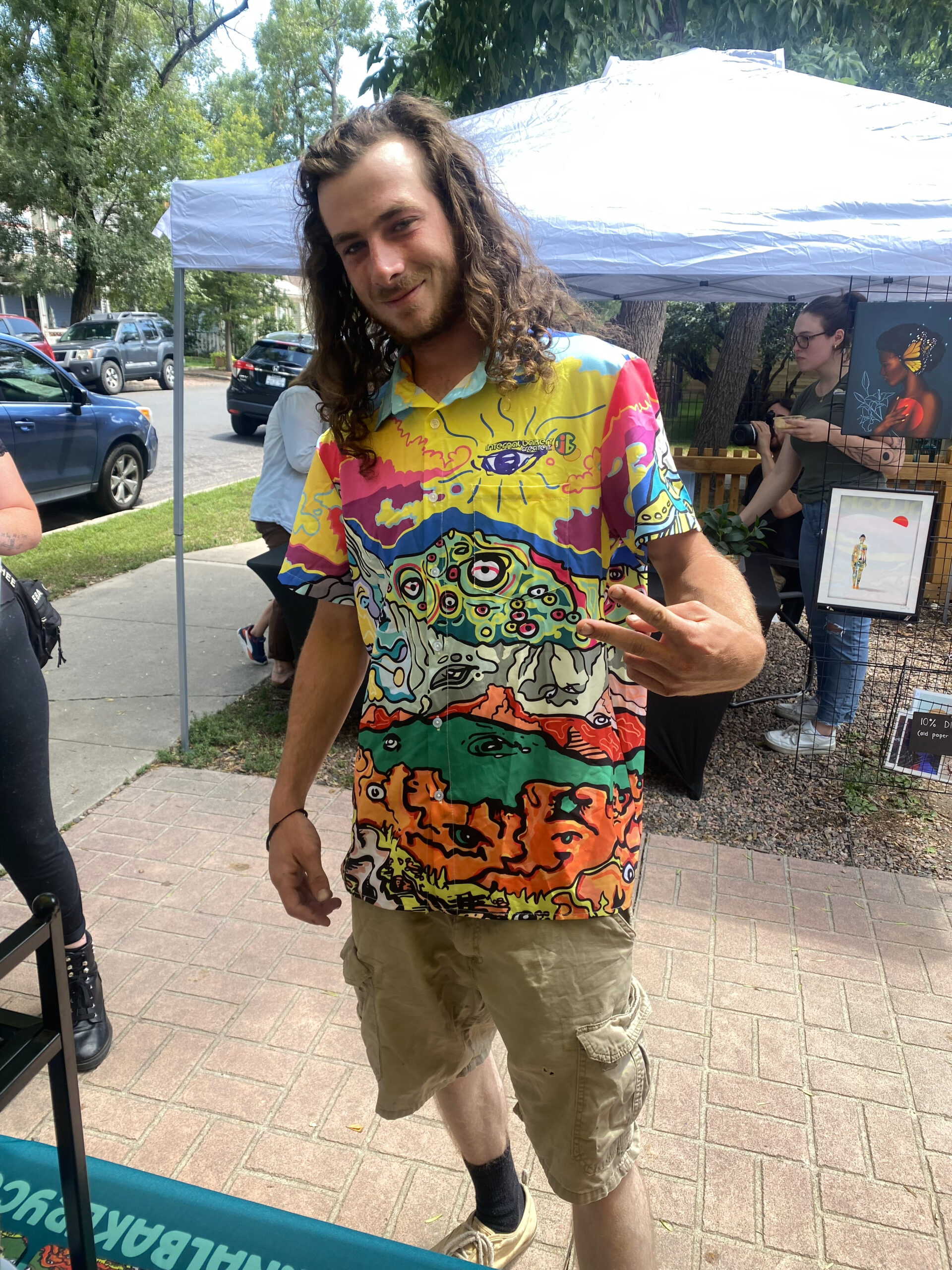 The 'Trippy Mountain' Friend-Making Shirt – See the Wild 🎨🐟👁️ Dive into a world of imagination with the Trippy Mountain Button-Up, featuring Zach Ray’s hand-drawn Front Range Mountains and Garden of the Gods with faces and characters embedding into the scene, this shirt captures the spirit of adventure—perfect for those who love to stand out and spark conversations. More than just a shirt, it’s a statement piece that invites curiosity, connection, and creativity. Whether you're by the water, in the mountains, or out in the wild, the Trippy Mountains is your bold companion for any adventure. ✨ Wear the unexpected. Make new friends. Unlock the Wild Within.