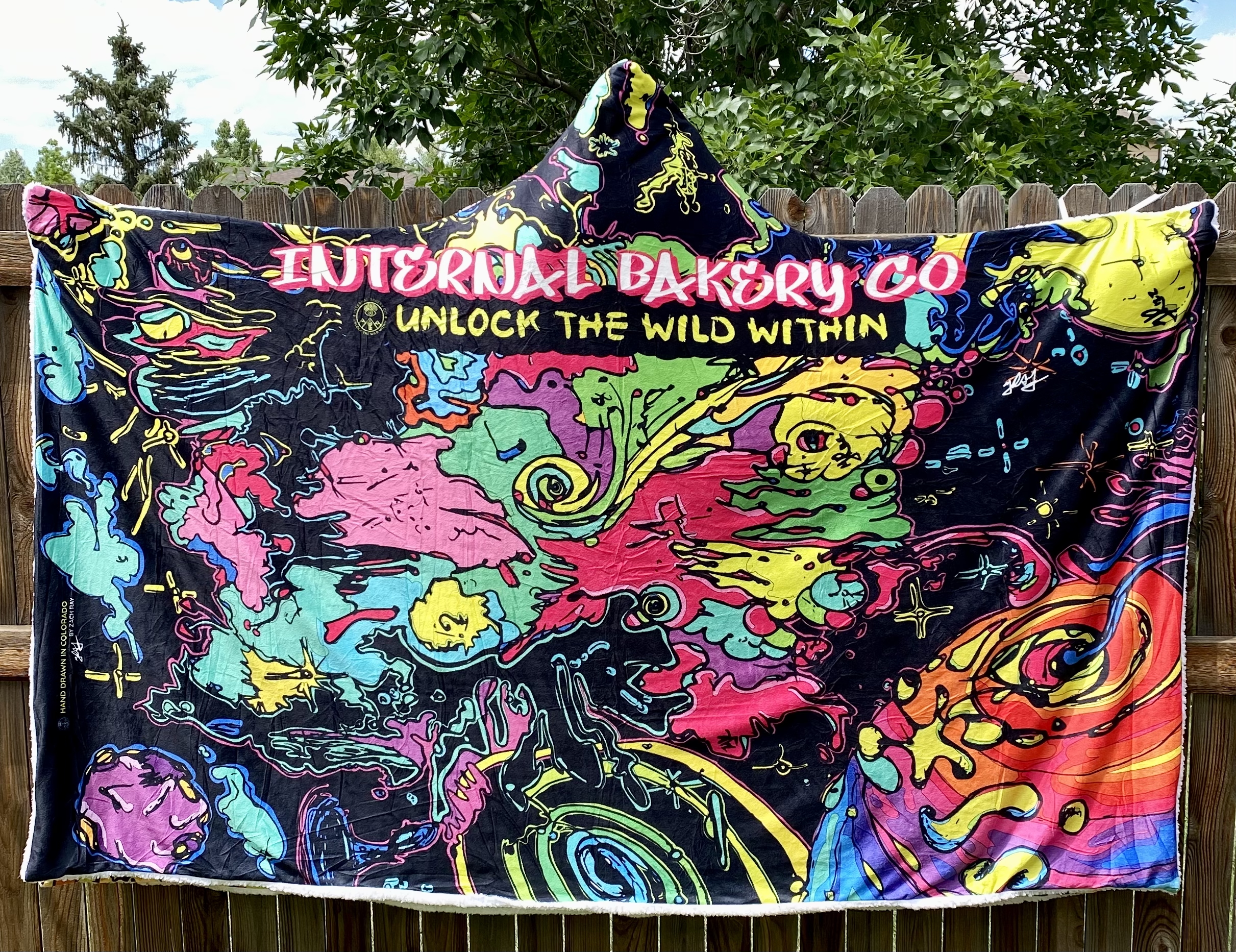 Wrap Yourself in Wild Comfort Perfect for cool Colorado evenings, festival nights, or stargazing in the backyard. These hooded blankets feature my original hand-drawn artwork printed in vibrant detail on luxuriously soft crystal velvet, with plush Berber fleece inside for warmth. Lightweight, cozy, and expressive, each cloak blanket is designed to move with you—whether you’re dancing in a field, camping under the stars, or simply unlocking the wild within from your couch. ✨ One size fits most (60" x 80") 🌀 Hand loop in the top corner for easy wrap-around comfort 🌿 Soft, lightweight, and warm 🎶 Perfect for festivals, camping, concerts, or home 🎨 Features 3 exclusive Internal Bakery designs