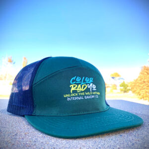 Color Rad Yo — Internal Bakery Snapback Hat 🧢🌄 Say it fast, say it twice — you might never call it Colorado again. Introducing Color Rad Yo, a bold twist on our home state brought to life by Internal Bakery. This 7-panel snapback features an Emerald green base embroidered with Lime, Sky Blue, and White threads for that vibrant pop you can spot from a mile away. Look closely and—like all Internal Bakery designs—you might just find a hidden face tucked within the letters. Born from imagination and stitched with style, this hat isn’t just a nod to Colorado—it’s a whole new vibe. Details: 🪡 Internal Bakery original design & embroidery 🟢 7-panel Emerald base 🌈 Lime, Sky Blue & White thread detailing 🎨 Hidden artistic touch within the font Add it to your collection and rep your state the Color Rad Yo way.