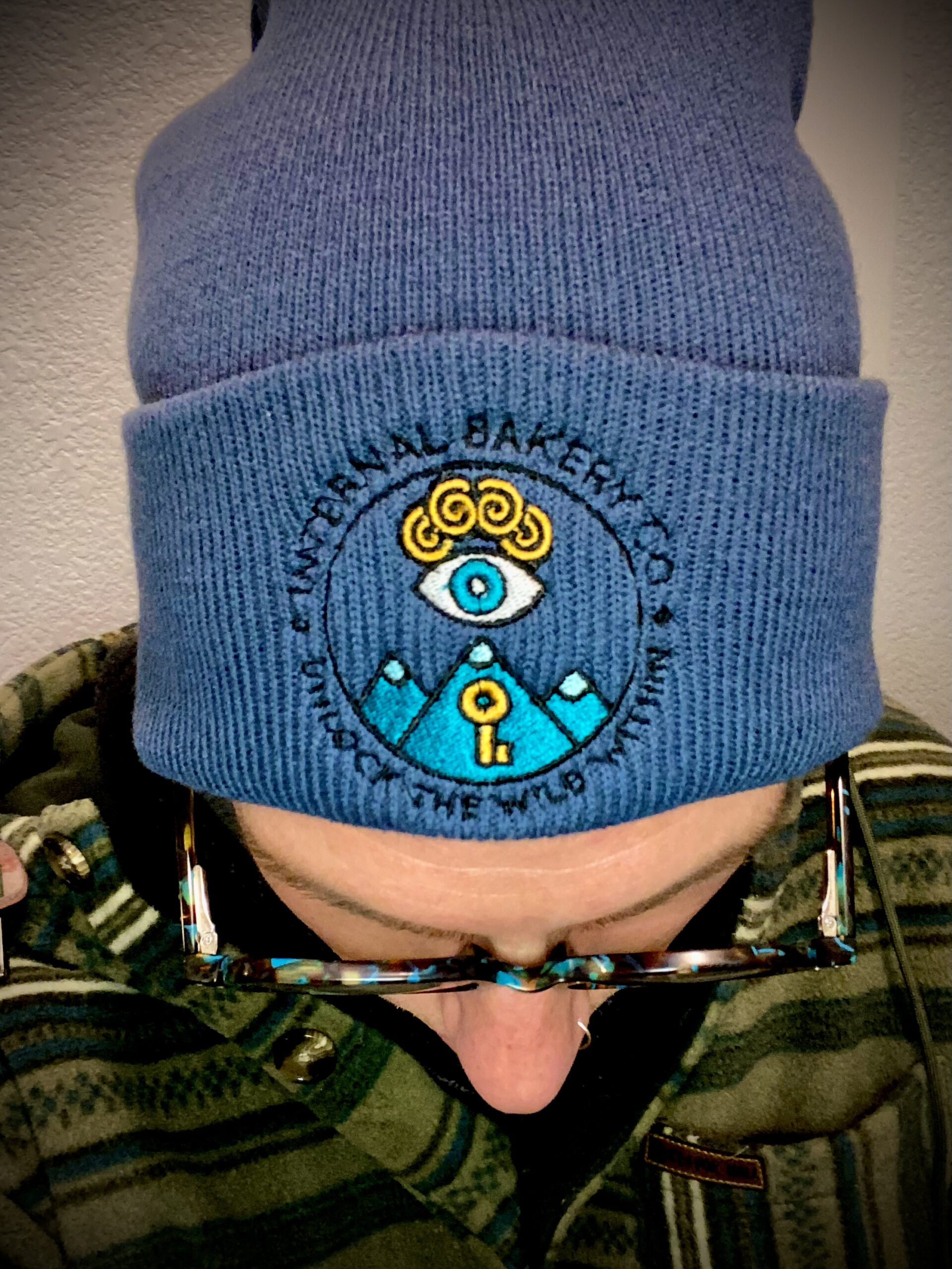 Meet the beanie that marks a new era for Internal Bakery. Featuring our brand-new rebranded logo, this piece embodies the heart of our mission — to Unlock the Wild Within and connect deeper with imagination, creativity, and the world around us. Crafted on a soft light navy base, the embroidery pops with bold color and intention, making this beanie more than just a hat — it’s a symbol of our journey and community. Whether you’re out exploring, creating, or simply staying cozy, it’s designed to move with you. Details: 🧵 Premium embroidery of the new Internal Bakery logo 🌊 Light Navy beanie — soft, warm, and built for everyday wear 🎨 Symbol of creativity, connection, and the wild within 🔥 Perfect for adventures, markets, or daily inspiration Wear the story. Feel the vision. Unlock the Wild Within.
