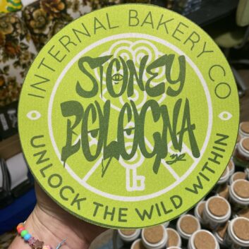 Get ready for a surprise straight from the imagination bakery. The Stoney Bologna Mystery Dab Mat is a 7.5" round, 5mm thick silicone mat featuring hand-drawn artwork where even the letters are a little stoned themselves — filled with fun faces, hidden expressions, and good vibes baked right into the design. The twist? You won’t know exactly which color palette you’re getting until it lands in your hands. Every mat is unique, so your mystery pick could be anything from electric neons to mellow earth tones, all tied together by the signature Stoney Bologna artwork. Perfect for your sesh setup, art table, or collector shelf — no two are the same, and that’s the fun of it. Details: 🌀 7.5" round x 5mm thick premium dab mat 🎨 Hand-drawn design with stoney letters & hidden faces 🔥 One-of-one color variations — shipped at random 💨 Heat-resistant, easy to clean, and made to vibe Add one to your cart and let the mystery unfold — each mat’s got its own buzz.