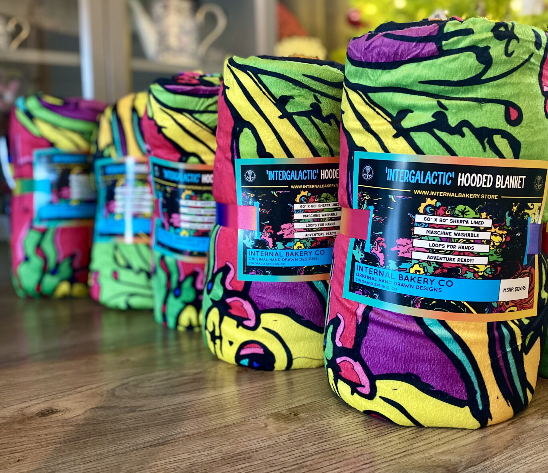 Wrap Yourself in Wild Comfort Perfect for cool Colorado evenings, festival nights, or stargazing in the backyard. These hooded blankets feature my original hand-drawn artwork printed in vibrant detail on luxuriously soft crystal velvet, with plush Berber fleece inside for warmth. Lightweight, cozy, and expressive, each cloak blanket is designed to move with you—whether you’re dancing in a field, camping under the stars, or simply unlocking the wild within from your couch. ✨ One size fits most (60″ x 80″) 🌀 Hand loop in the top corner for easy wrap-around comfort 🌿 Soft, lightweight, and warm 🎶 Perfect for festivals, camping, concerts, or home 🎨 Features 3 exclusive Internal Bakery designs